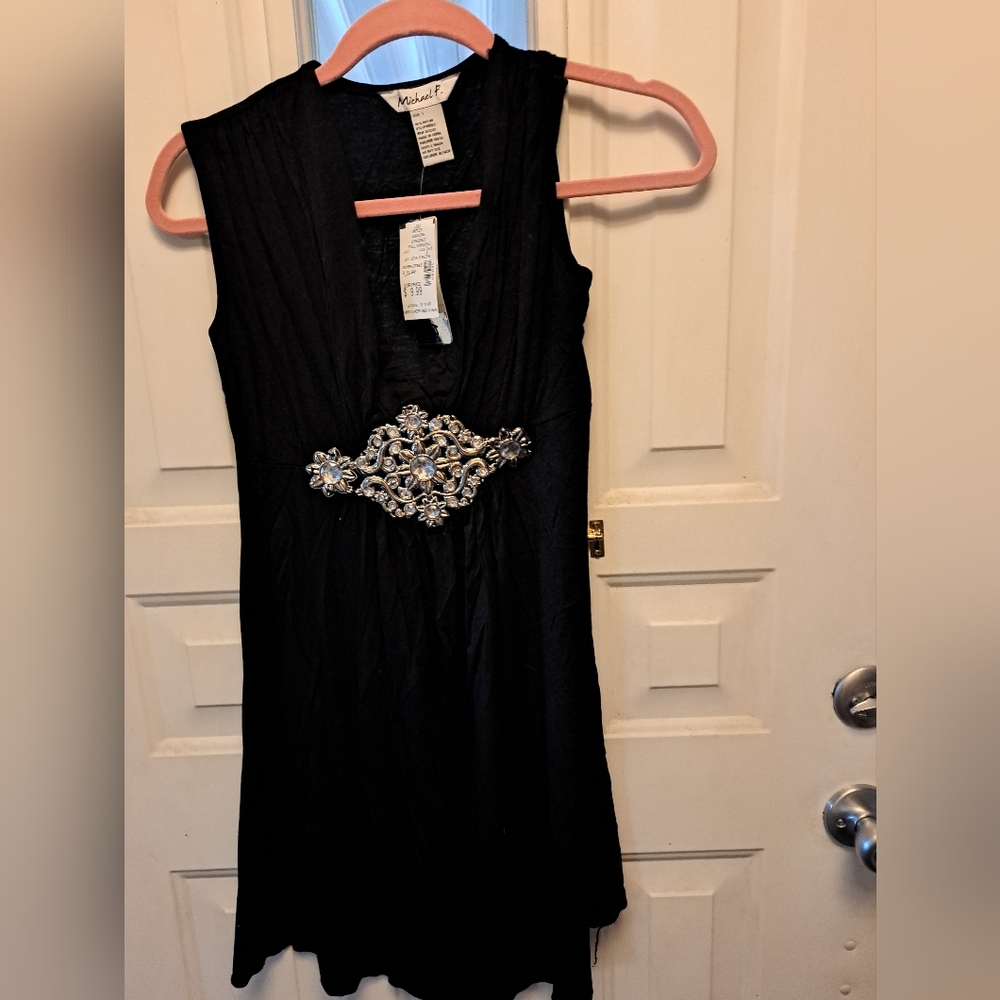 Elegant Black Sleeveless Dress with Embellished Waist